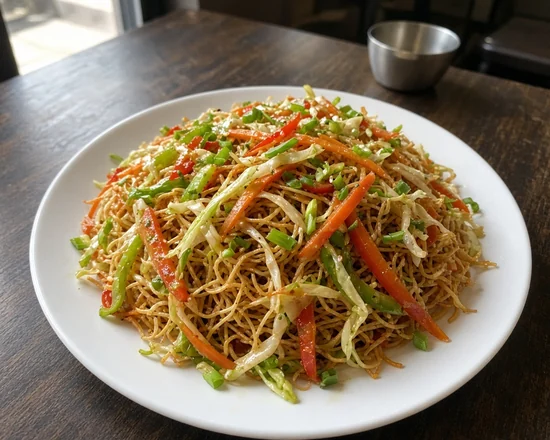 Hakka Noodles: hakka noodles with cabbage, carrot and bell peppers