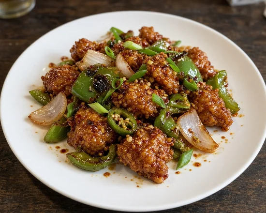 Chili Chicken: chili chicken with green peppers and onion